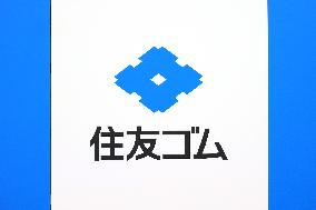 Sumitomo Rubber Industries signboard and logo